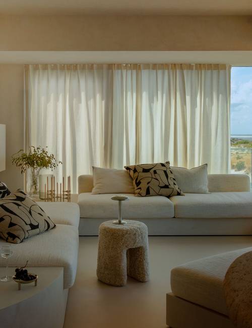 Living room in seaside flat with Socrete floor